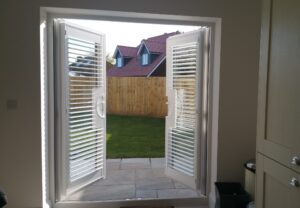 patio-door-shutters-open-the-great-shutter-co Winchester