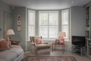 Traditional Bay Window Shutters Installed By The Great Shutter Co. In Farnham